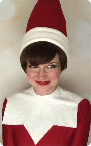 Elf on the Shelf character in red and green elf costume