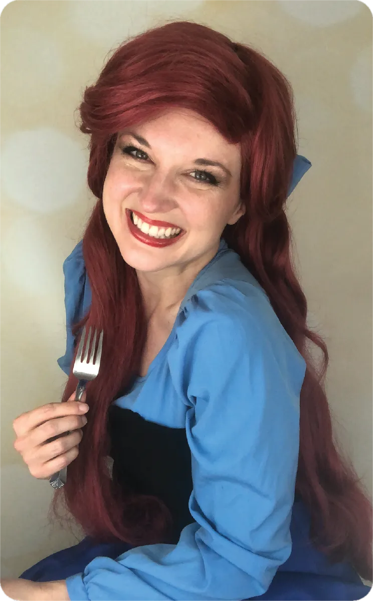Ariel from The Little Mermaid in shimmering aqua costume